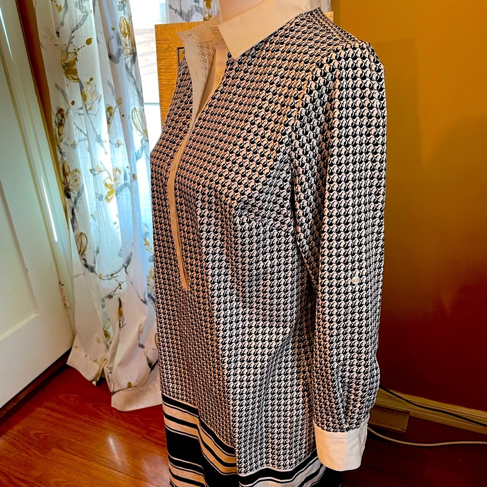 Ann Taylor graphic design dress with horizontal striped bottom. PM